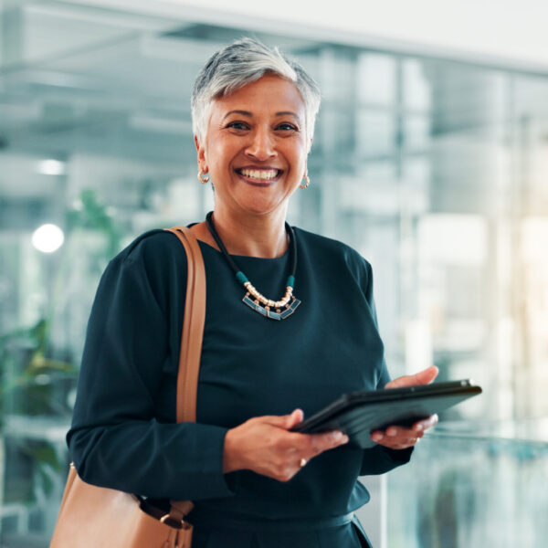 Portrait, research and tablet with business woman in office for information, project management, report. App, internet and smile with mature employee in professional workplace for company development Portrait, research and tablet with business woman in office for information, project management, report. App, internet and smile with mature employee in professional workplace for company development.