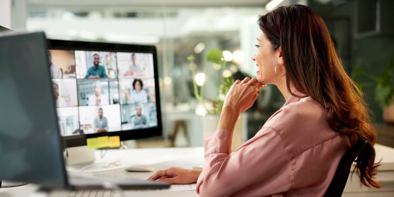 Video conference, computer and business woman with smile, notes and creative training on screen in startup. Webinar, online call and copywriter with notebook, group and virtual chat or news meeting Video conference, computer and business woman with smile, notes and creative training on screen in startup. Webinar, online call and copywriter with notebook, group and virtual chat or news meeting.